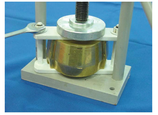 Effect of Flask Closure Method and Post-Pressing Time on the Displacement of Maxillary Denture Teeth